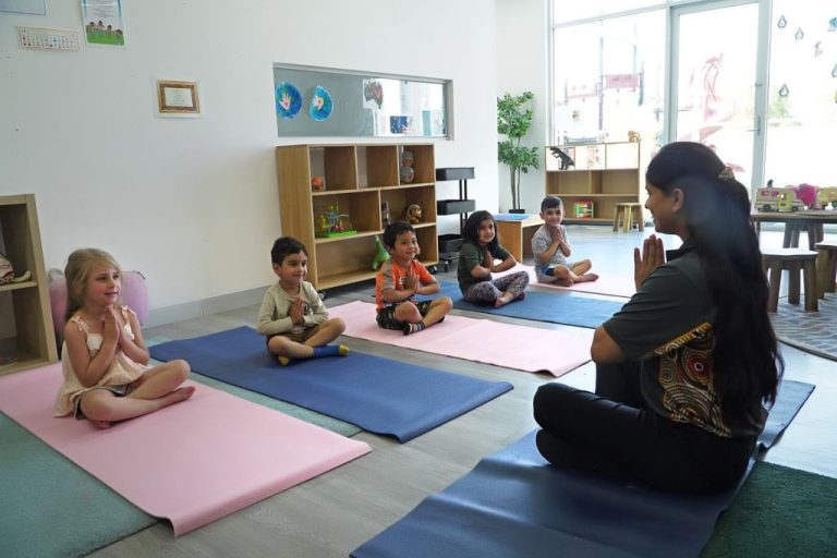 Kinder children doing yoga and mindfulness